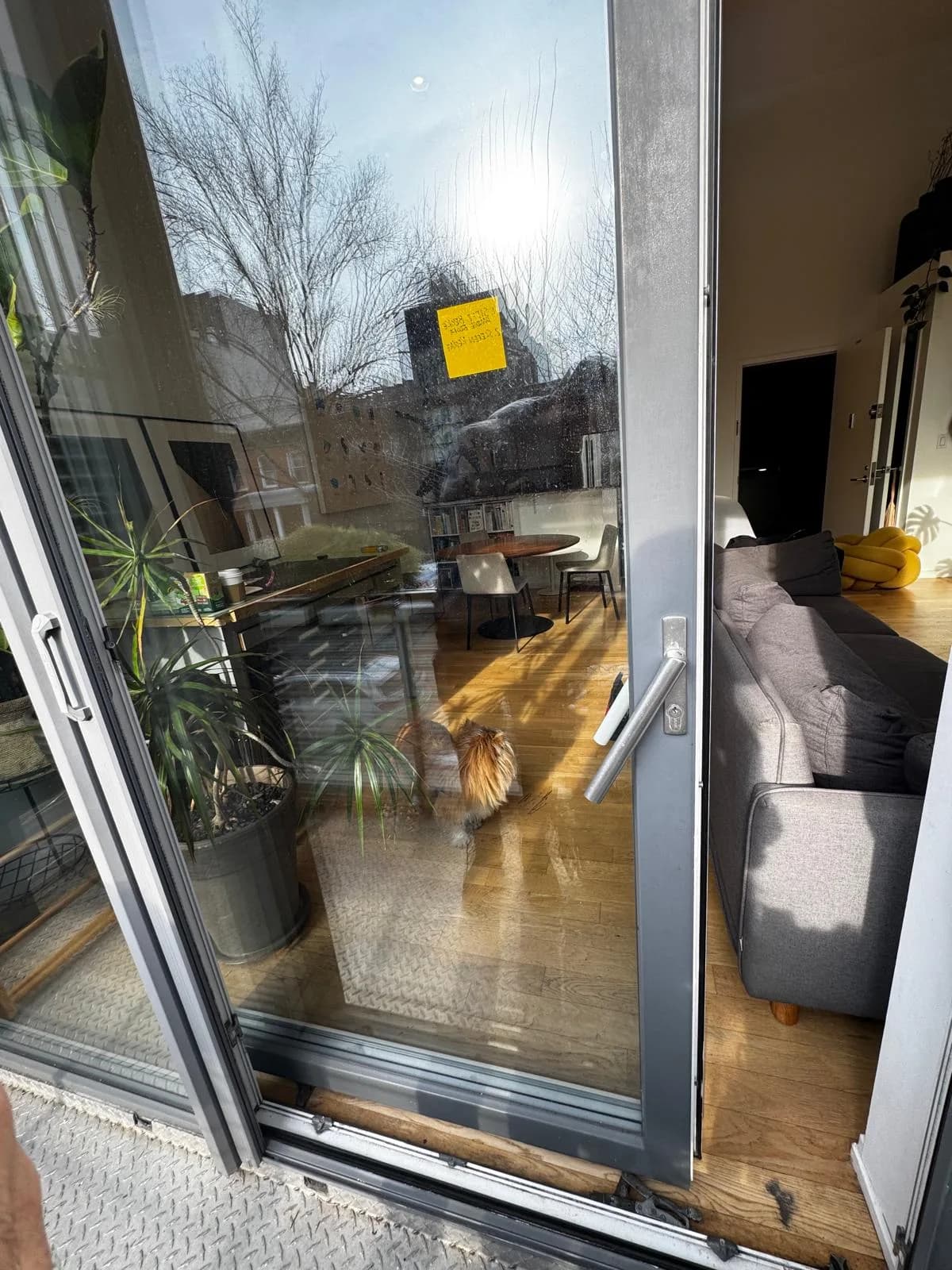 Glass sliding patio door showing door panels and threshold