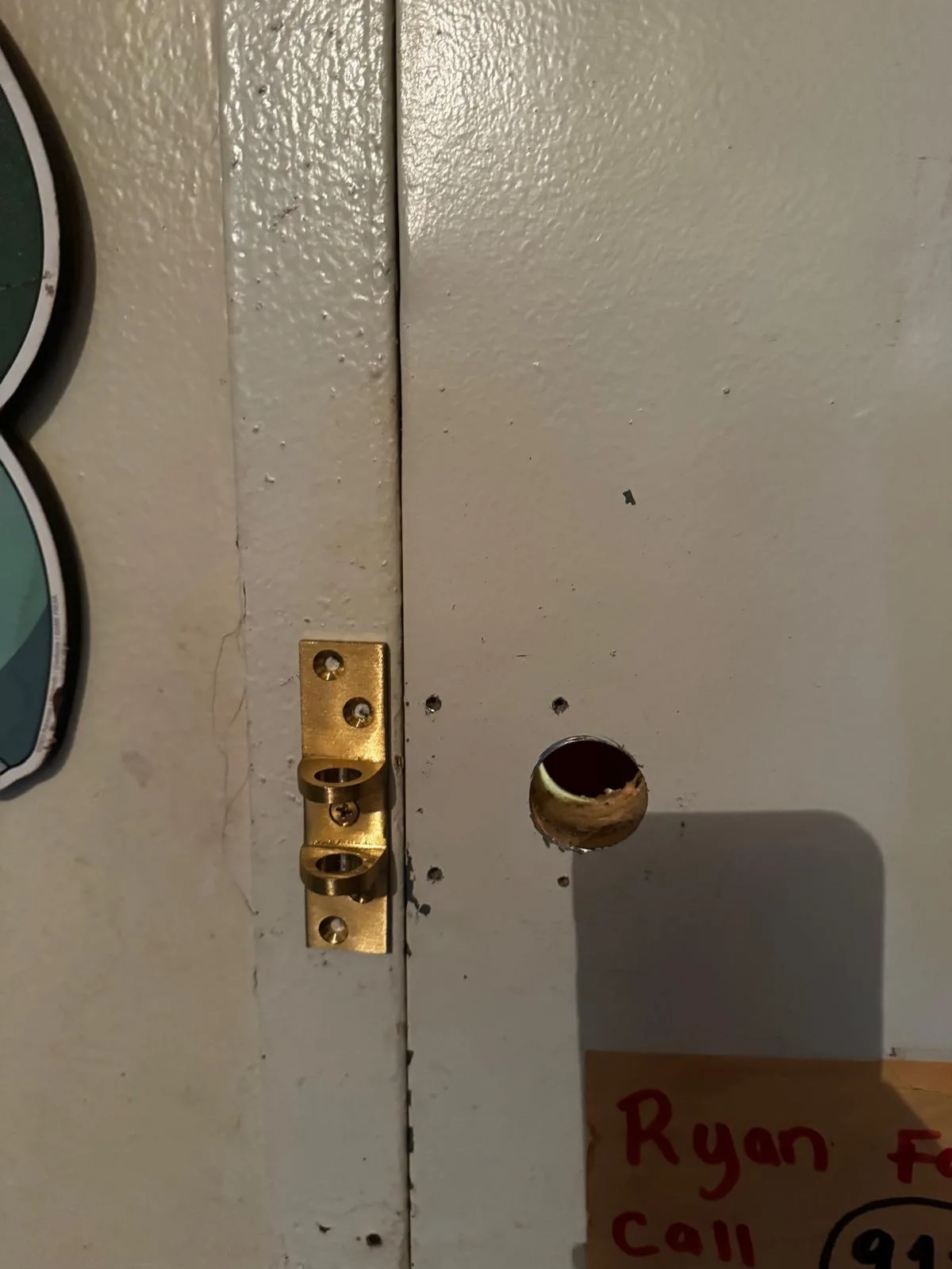 Removed door lock cylinder during hardware servicing