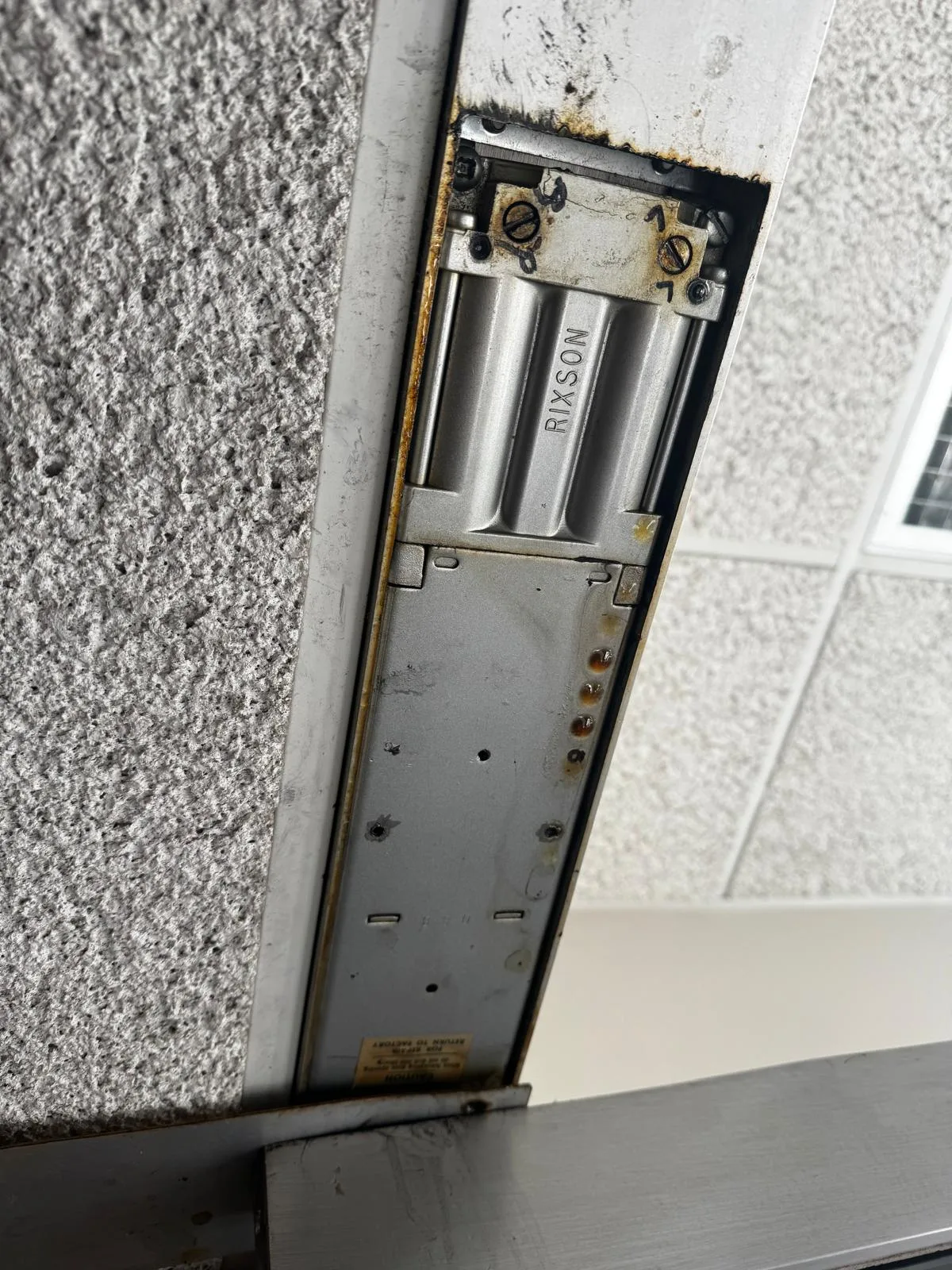 Floor door closer box exposed
