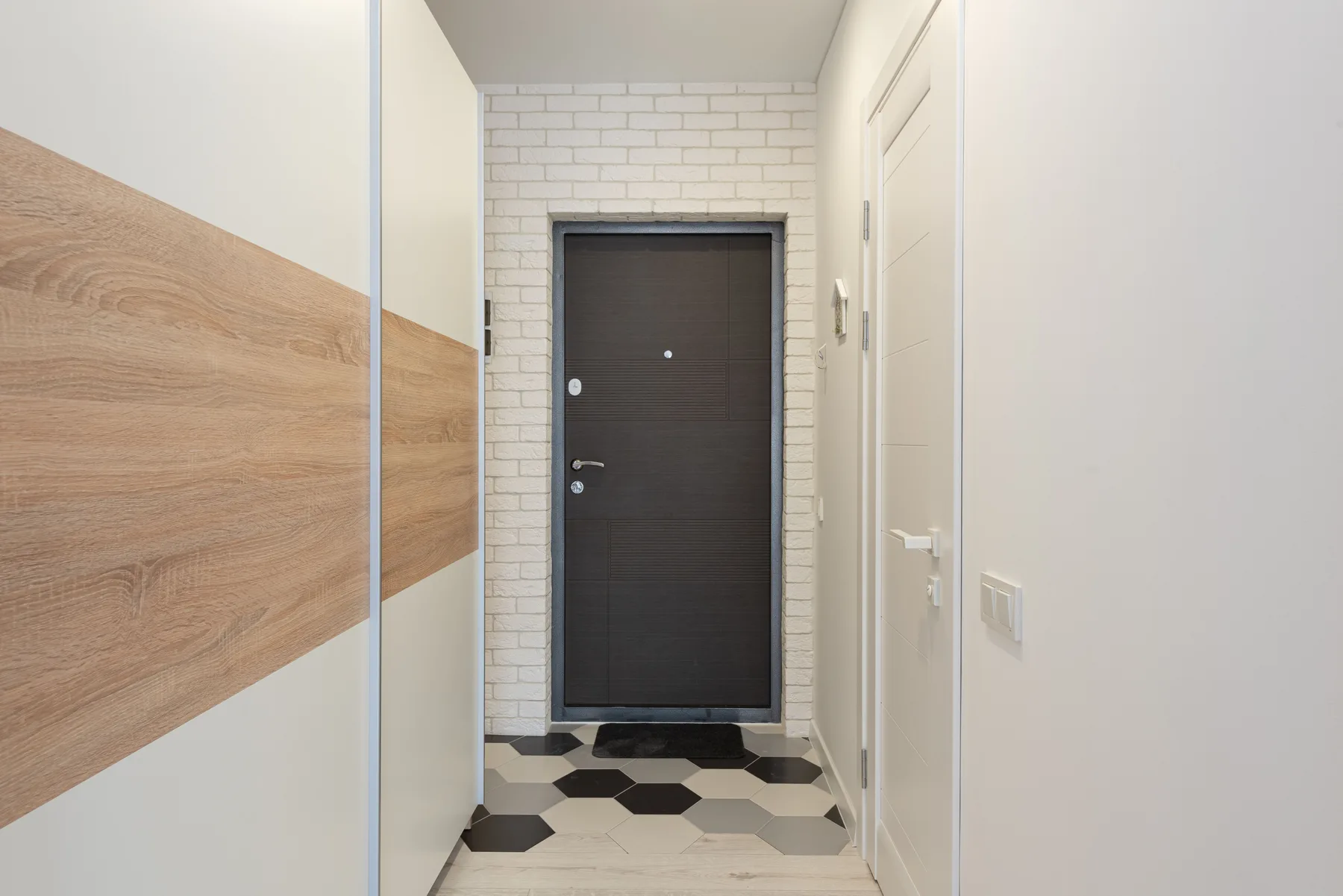 Dark front door wood wall