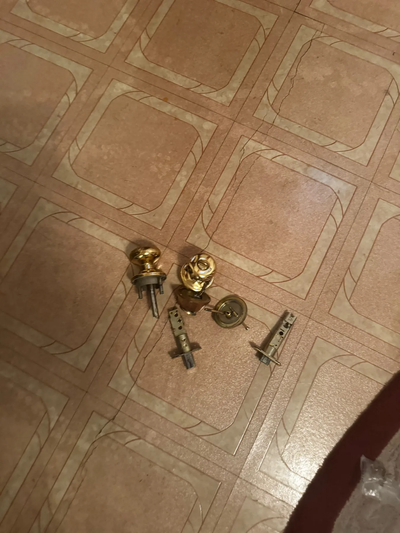Removed door lock parts on floor