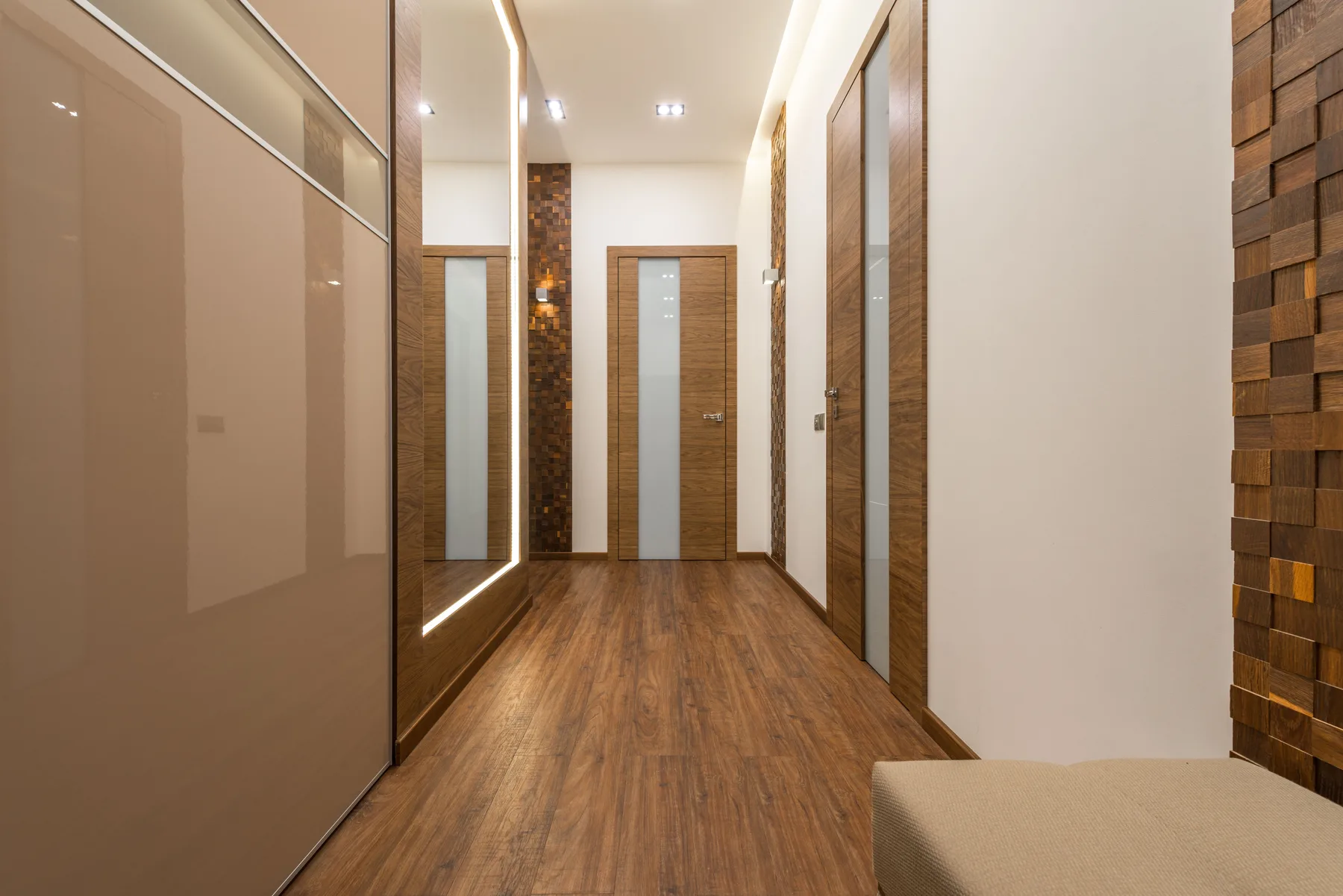 Warm wood door lined corridor