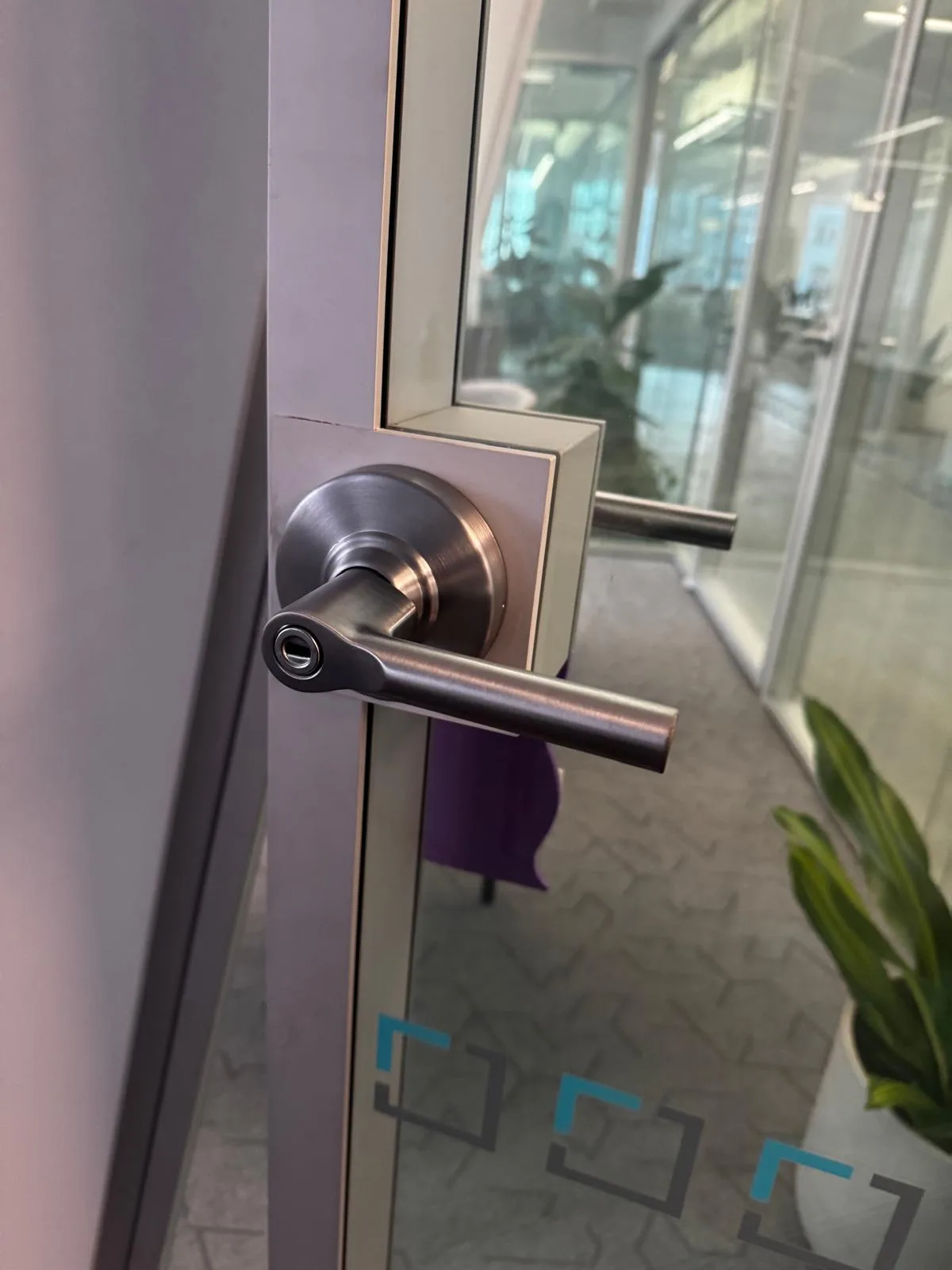 Glass door lever lock installed