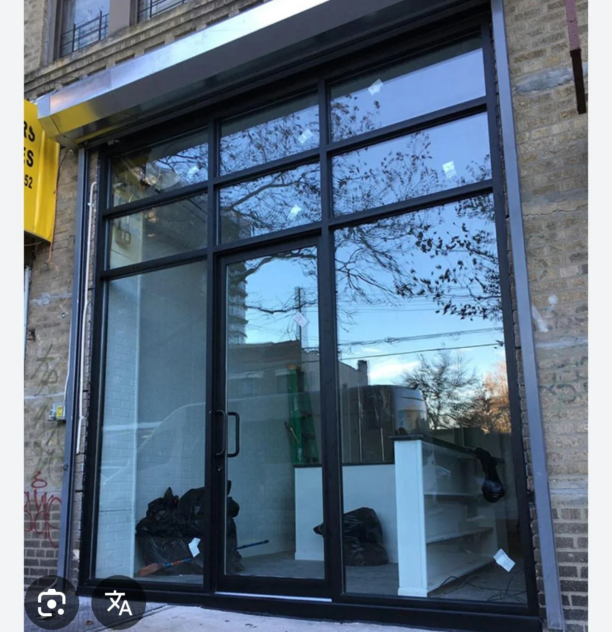 Glass storefront entry doors