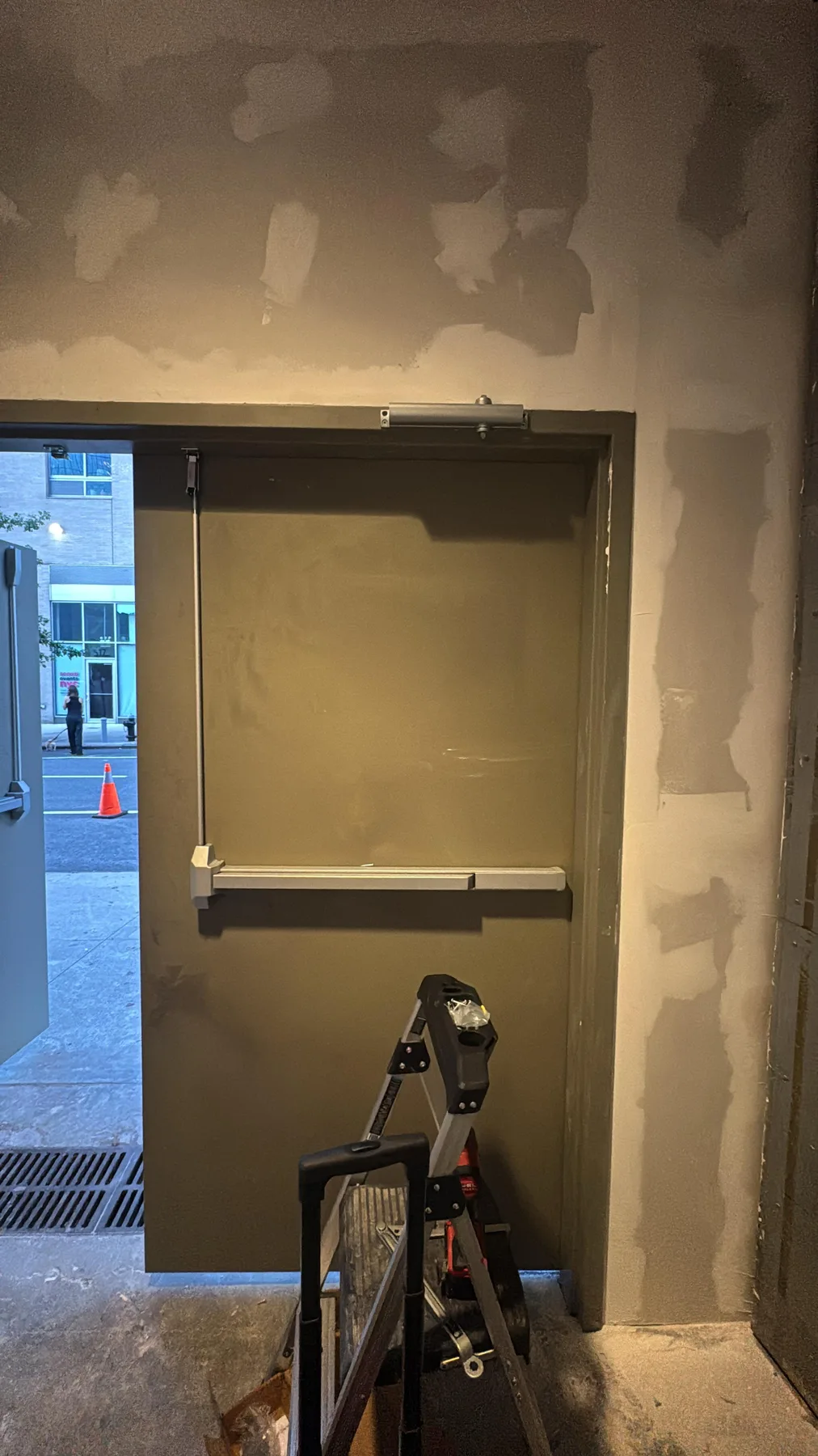 Commercial exit door with panic bar