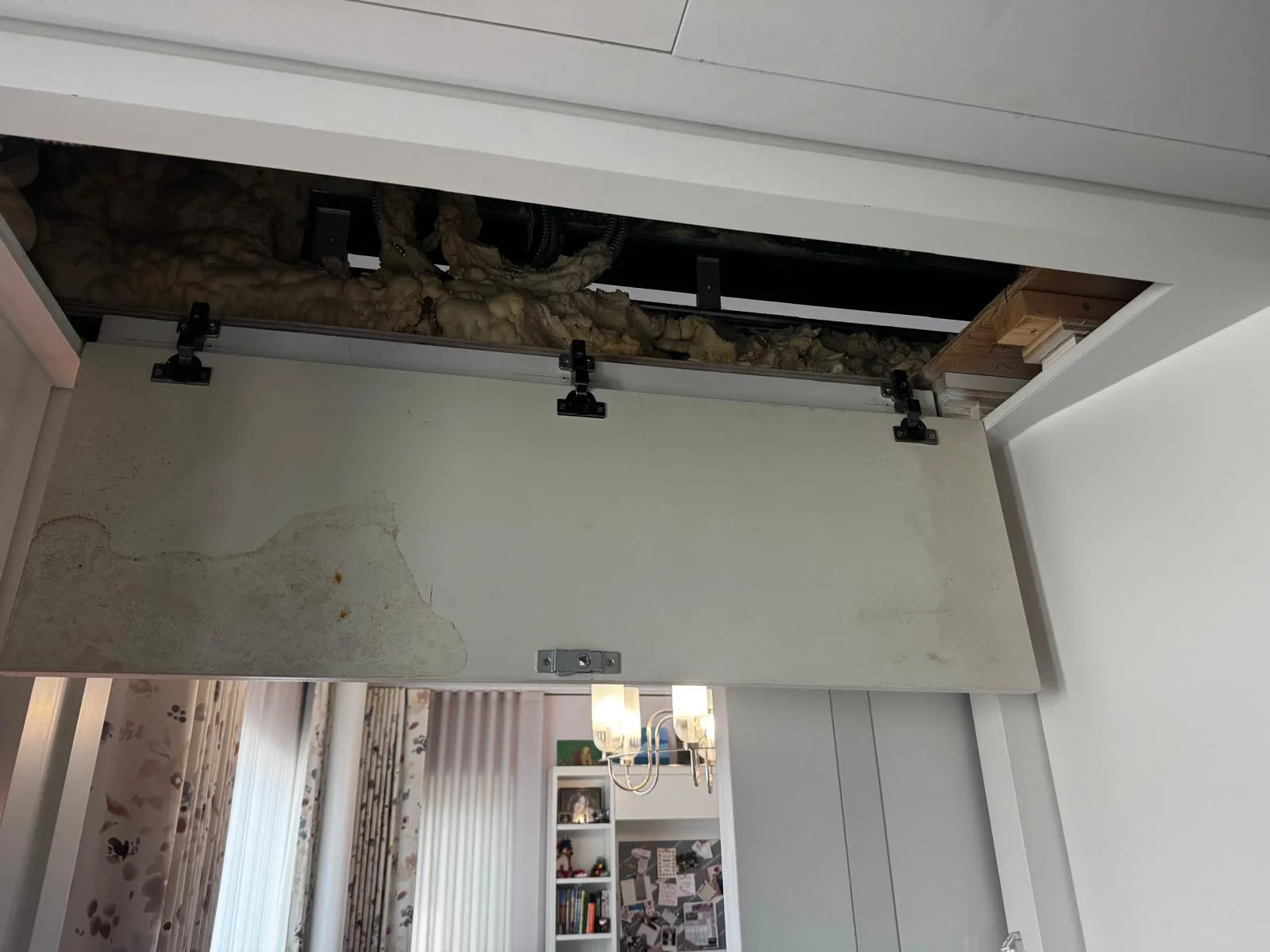 Pocket door roller track access