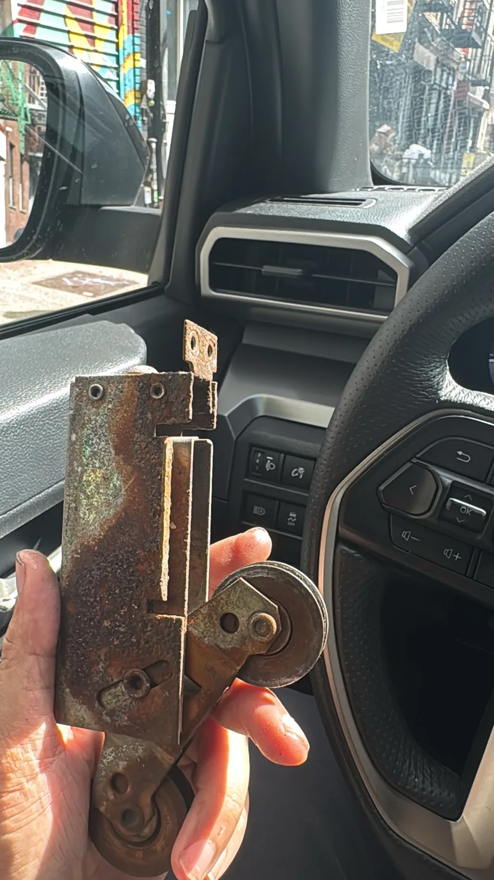 Sliding door latch mechanism removed