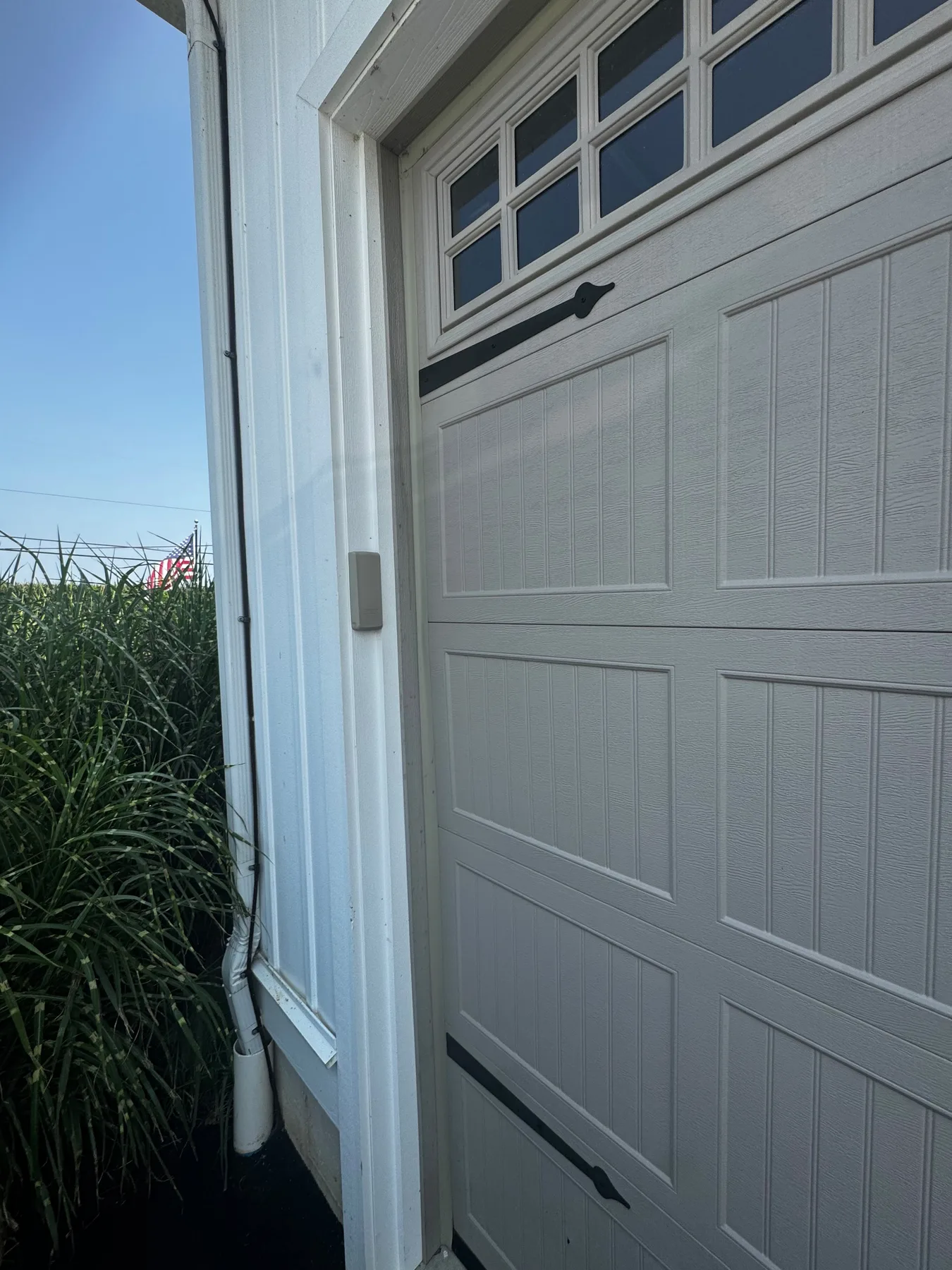 Garage door side panel and track