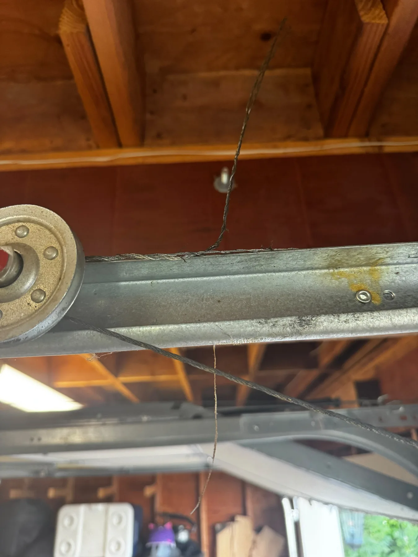 Garage door torsion spring bracket