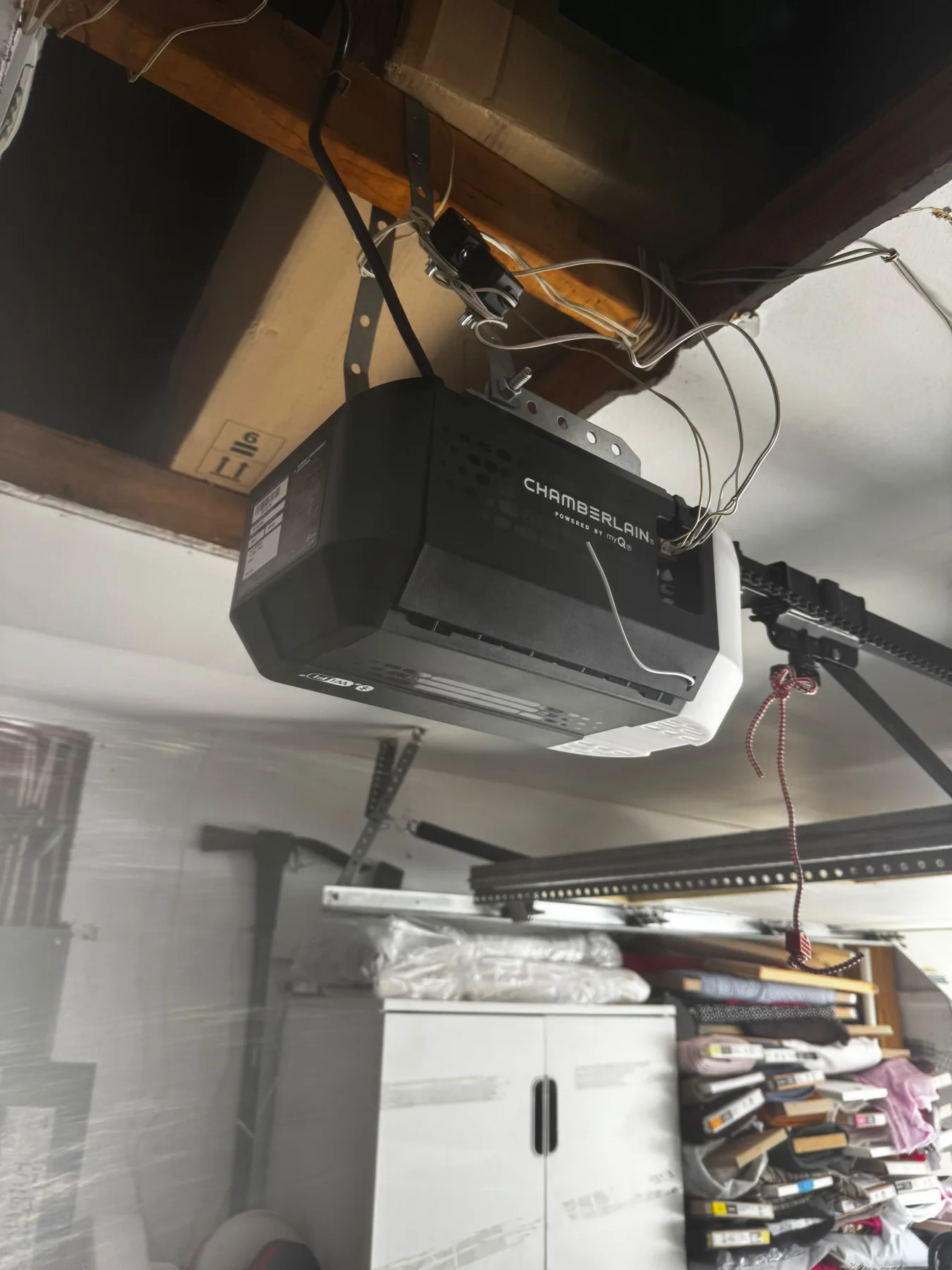 Overhead garage door opener track