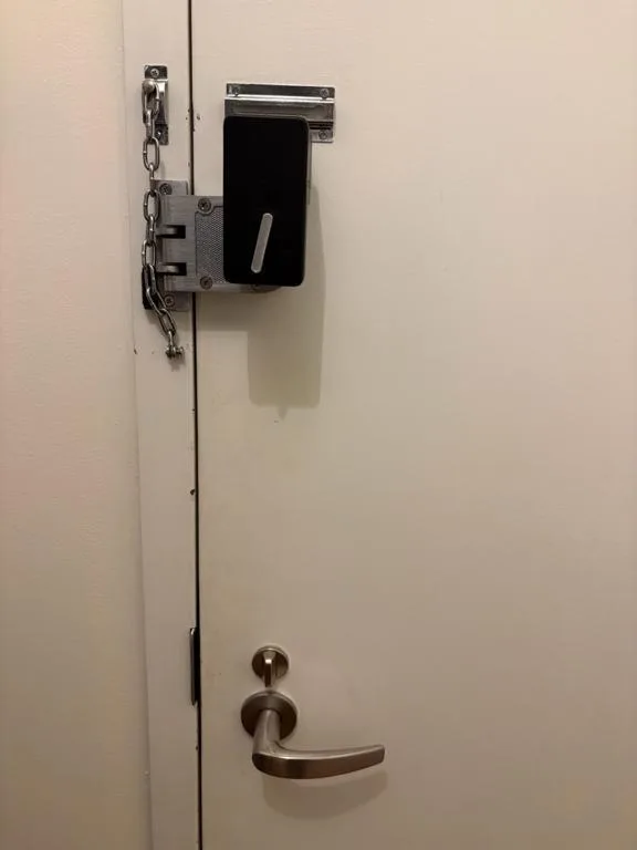 Access control lock on white door