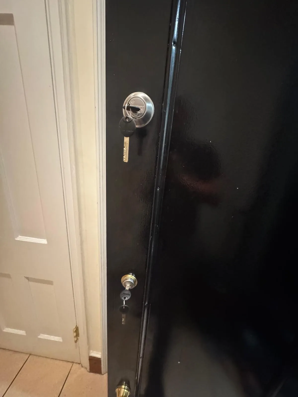 Dark door deadbolt lock detail